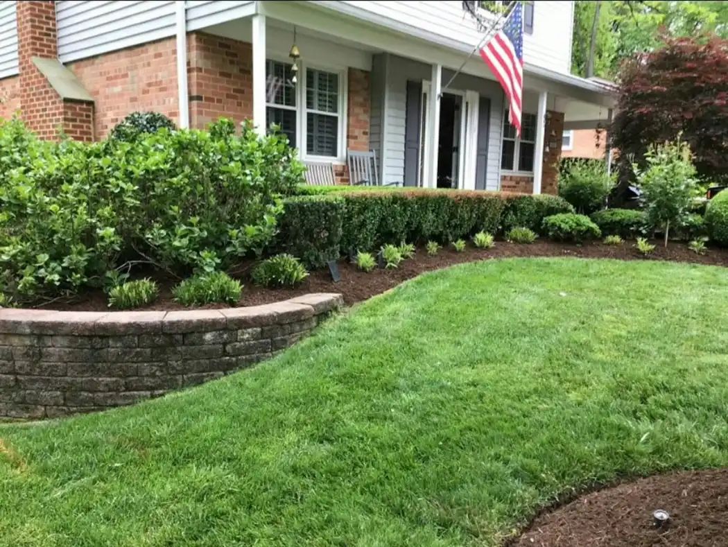 Low garden wall along a front lawn of a home in Greenville NC