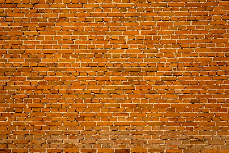 Brown clay wall cladding, masonry repair in Greenville NC