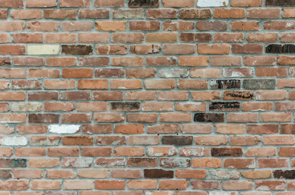 Brown brick wall, paver patio in Greenville NC
