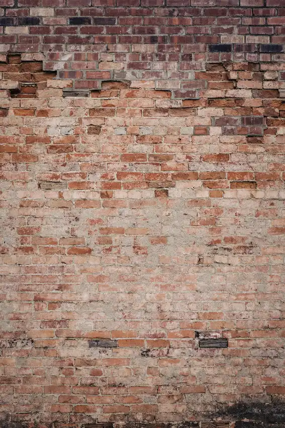 Brown brick wall during daytime, paver patio in Greenville NC