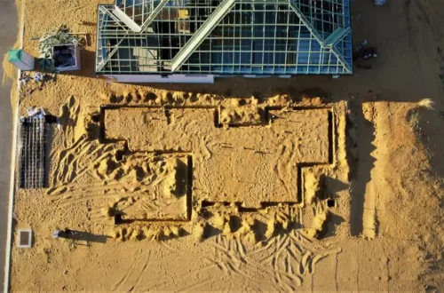 An aerial view of a building in the sand, block foundation in Greenville NC