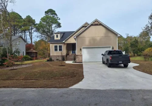 Finished concrete driveway with a parked truck