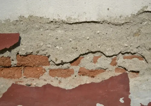 Red-painted wall, masonry repair in Greenville NC