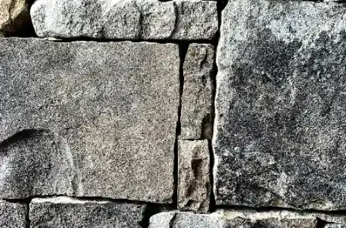 Gray and black brick wall, stone masonry in New Bern NC
